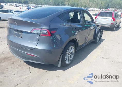 2023 Tesla Model Y Awd/Long Range Dual Motor All-Wheel Drive z USA, uszkodzony, nr VIN 7SAYGDEE2PF791592